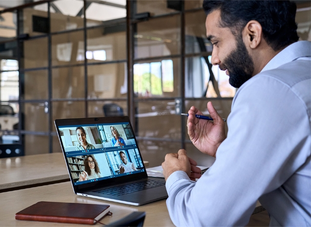 Young business owner running a meeting through Zoom